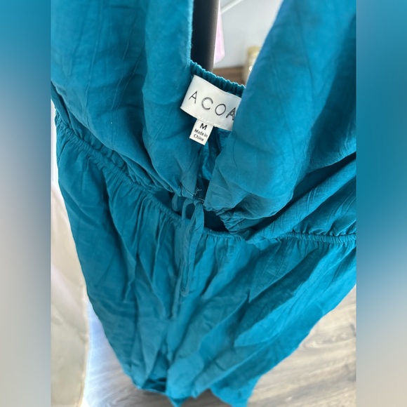 Aqua jumpsuit worn 3-4 times. Size Medium.  Adjustable strings. - Picture 4 of 7